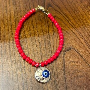 Evil eye red bead bracelet with lobster clasp size 7 inches